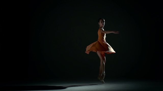 little cute girl ballerina in dress large hall. slow motion