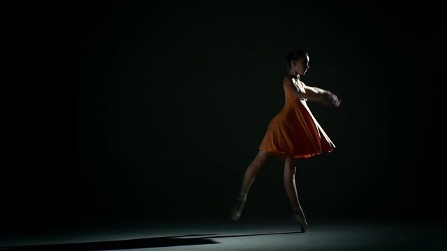 cute girl ballerina in dress large hall. slow motion