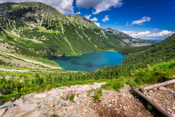 Beautiful lake in the middle of the mountains at dawn © shaiith