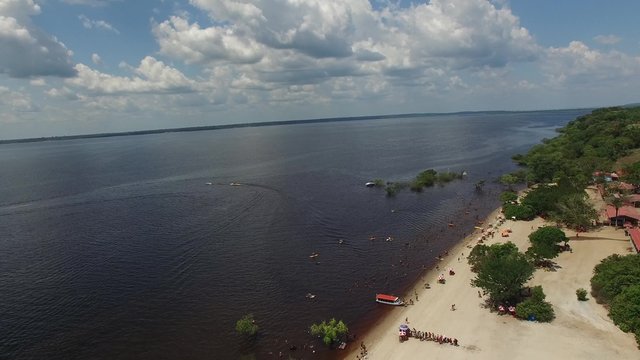 People enjoying a beach in Amazon, Manaus, Brazil