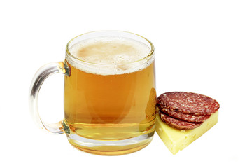 Mug excellent beer and  gorgeous piece of cheese with sausage wi