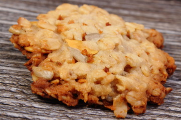 Oatmeal cookies on wooden background