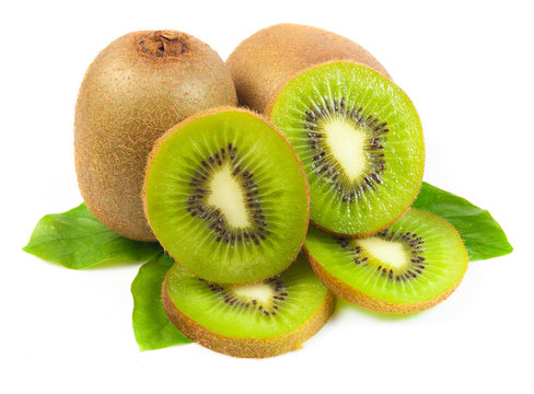 Juicy kiwi fruit and leaves isolated on white