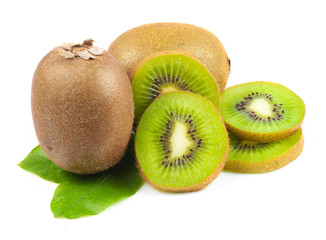 Juicy kiwi fruit and leaves isolated on white