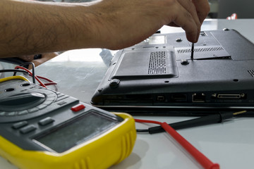 Repairing a notebook.