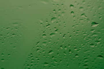 Natural water drops on glass