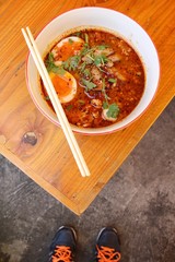 Selfie of shoes with ramen
