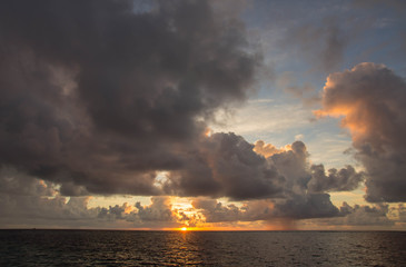 Beautiful cloudy sky at sunset in the tropics