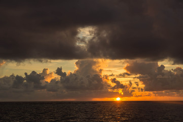 Beautiful cloudy sky at sunset in the tropics