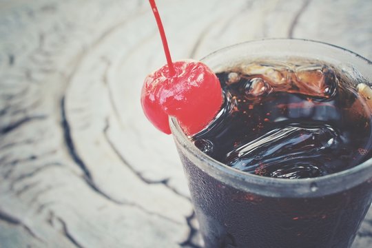 Cola with cherry