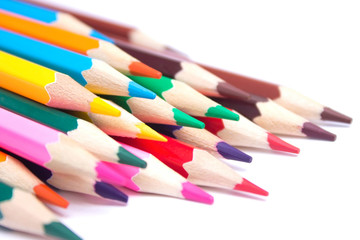 colored pencils on an isolated background