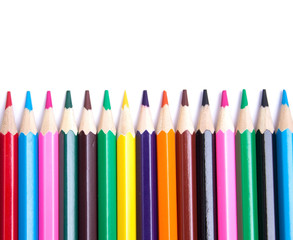 colored pencils on an isolated background