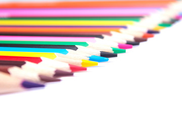 colored pencils on an isolated background
