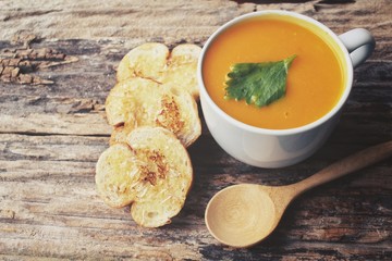 Pumpkin soup with garlic and herb bread