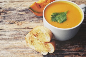Pumpkin soup with garlic and herb bread
