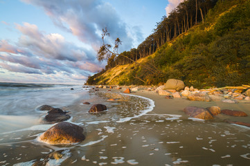 Beach and cliff in Wolin National Park in the light of the wonderful sunset