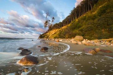 Tuinposter Kust Beach and cliff in Wolin National Park in the light of the wonderful sunset
