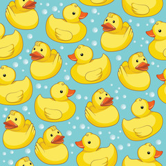 Vector seamless pattern with yellow ducks