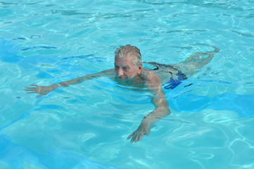 Senior Man in Swimming Pool