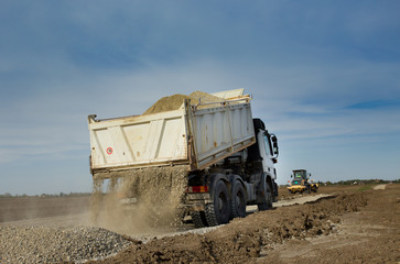Truck tipping gravel