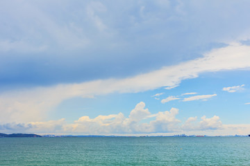 Sea landscape with mountains and clouds