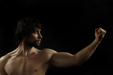 Obraz na płótnie Canvas portrait of a man with biceps