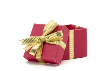 christmas gift box with a gold ribbon bow