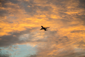 Plane Ascending at Dawn