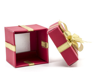 christmas gift box with a gold ribbon bow