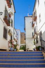 Fototapeta na wymiar Typical whitewashed houses along the streets of the city of Cordoba, Spain