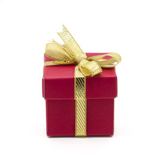 christmas gift box with a gold ribbon bow
