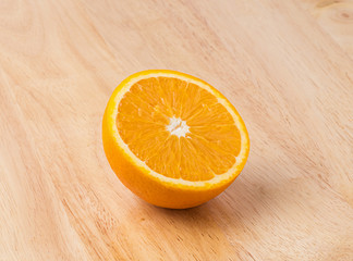 Fresh oranges on wooden background