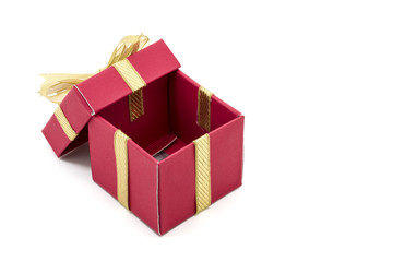 christmas gift box with a gold ribbon bow