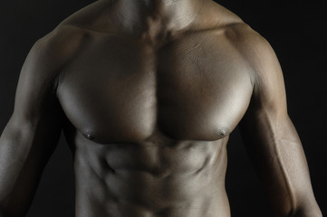 Fototapeta na wymiar A black man with a muscular body