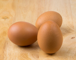 Eggs on wood background