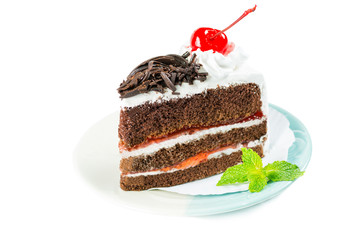 Chocolate cake delicious decorated with whipped cream and cherri