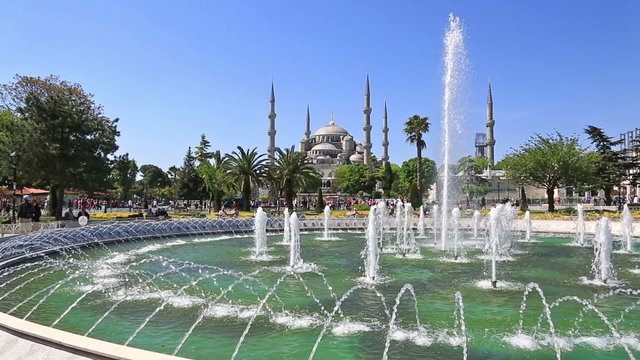 Scenic view at fountain and The Blue Mosque in summer Instanbul, Turkey
