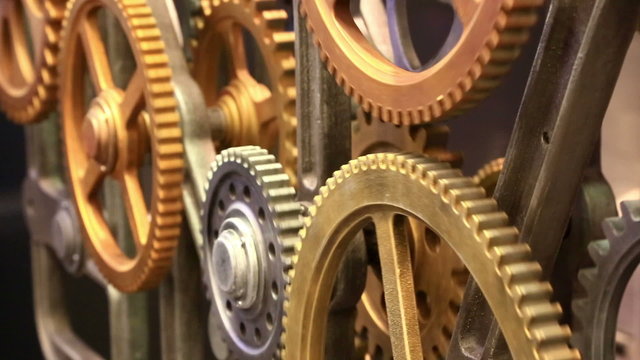 Close up view at clockwork with gears rotating smoothly