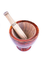 wooden mortar and pestle isolated on white background