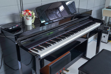 A black electronic piano