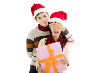 young couple with gift box for christmas holiday