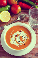 Pumpkin Soup with tomatoes, chili, yogurt and black sesame seeds