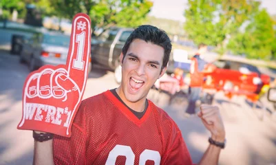 Foto op Plexiglas Tailgating: Excited Fan Wearing Foam Finger And Cheering © seanlockephotography