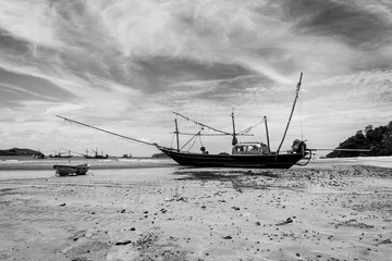 Boat on the beach and blue sky in Thaniland,black and white tone