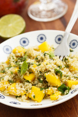 Quinoa salad with mango and herbs