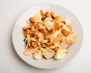 Salad with eggs, crackers and beacon