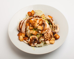 The salad with meat, mushrooms, crackers and cabbage