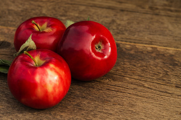 red apple on a blurred background of apples
