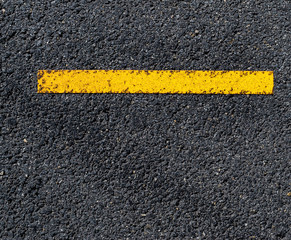 Fototapeta premium grungy, dirty view of asphalt with distinct red stripe