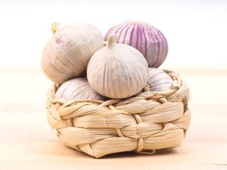 Fresh garlic in a small basket
